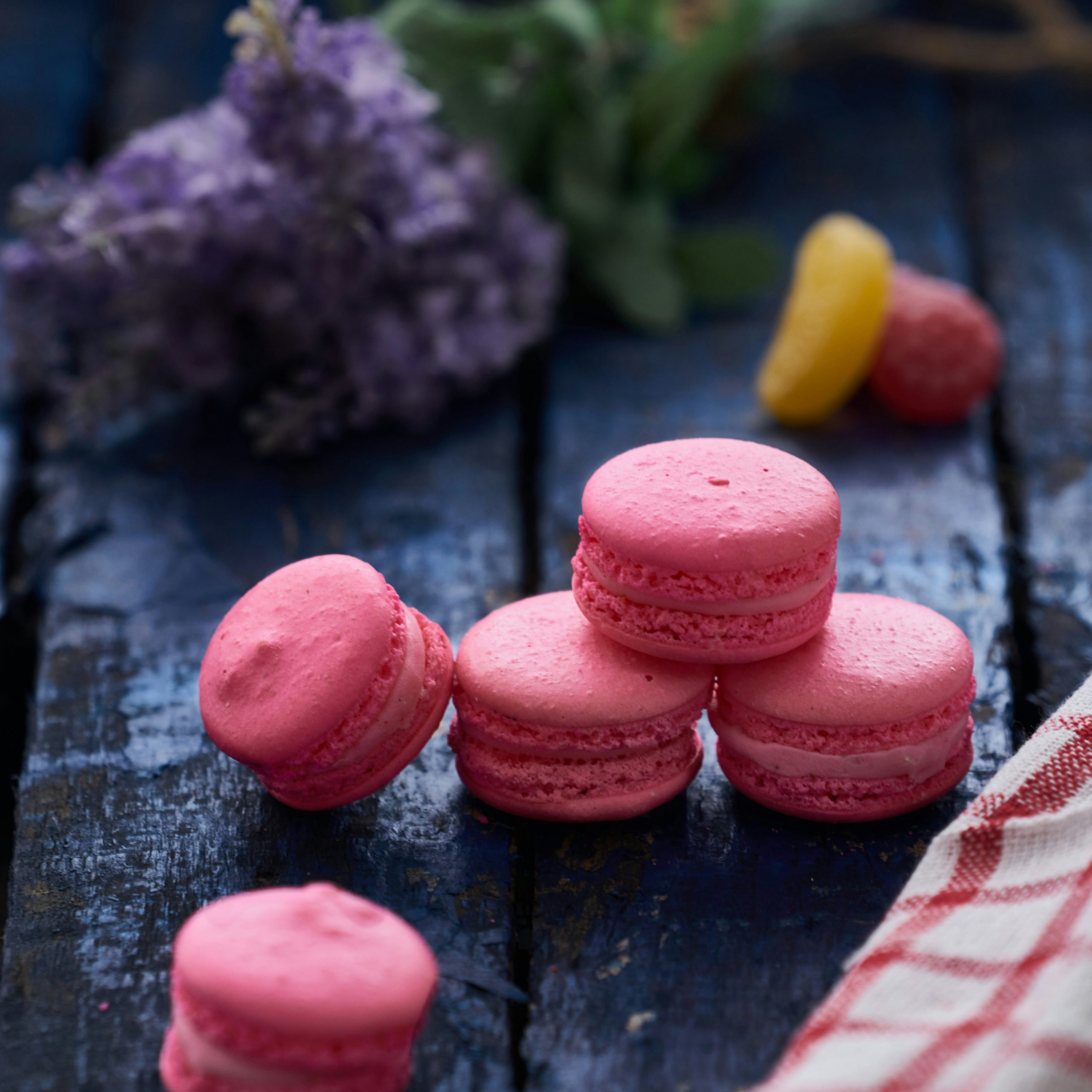 Pink macaroons with lavender in the background